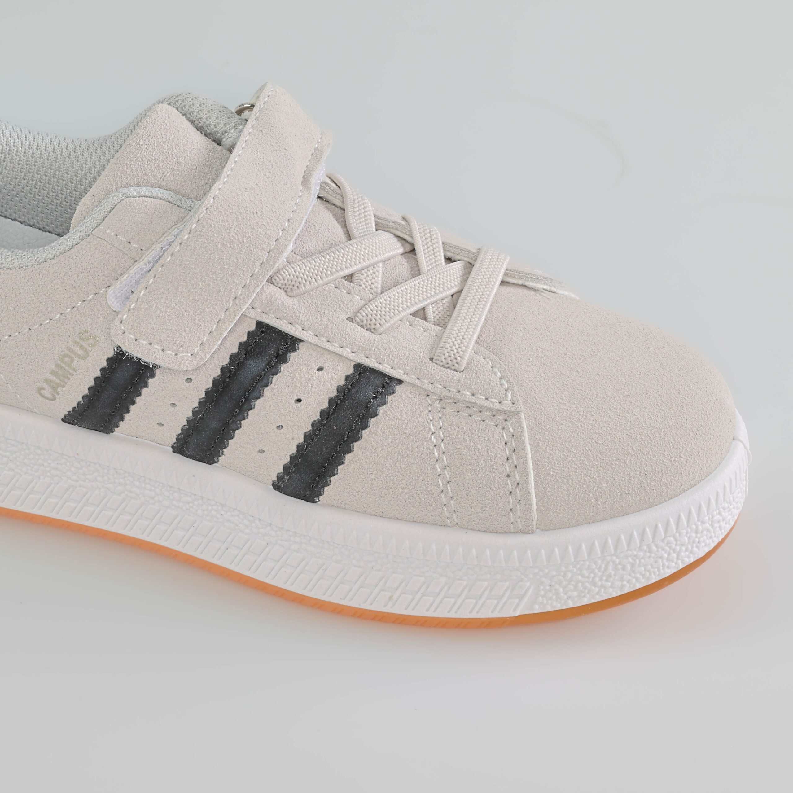 JOVAN – Baskets Enfants en Gris.