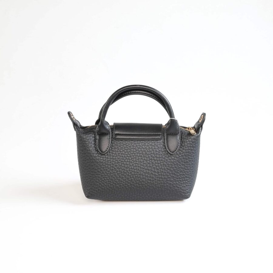 Sac à main en cuir noir, accessoire mode pour femmes, élégant et pratique..
