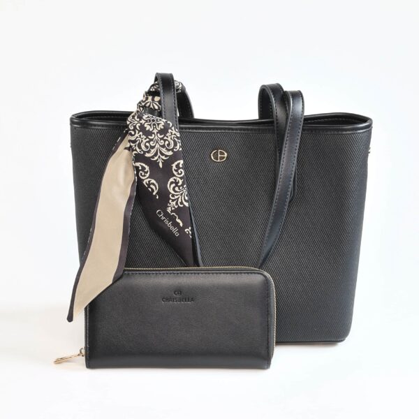 Sac à main en cuir noir avec portefeuille assorti, élégant et pratique..