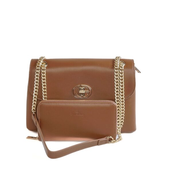 Sac à main en cuir avec chaîne dorée, parfait pour un look chic et sophistiqué..