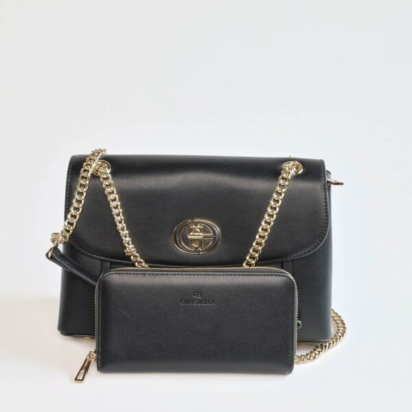 Sac à main noir avec chaîne dorée, accessoire chic pour toutes occasions..