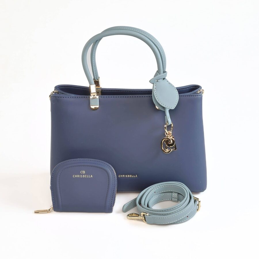 Sac à main en cuir bleu avec poignée, porte-monnaie et bandoulière assortis, parfaits pour un style..