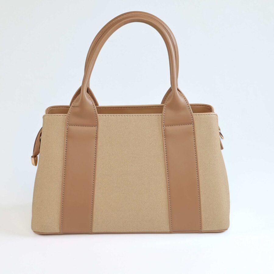 Vela – Sac à main en Beige.