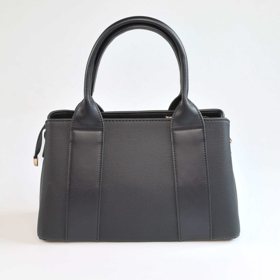 Sac à main en cuir noir, parfait pour un style chic et sophistiqué. Idéal pour toutes les occasions,..