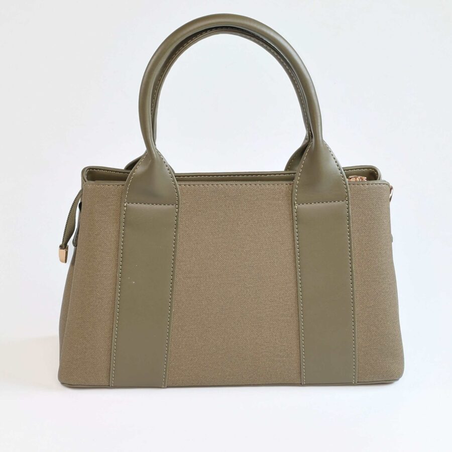 Sac à main beige en toile et cuir, élégant et pratique, idéal pour un look chic et décontracté..