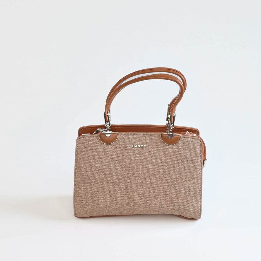 Sac à main beige avec poignées en cuir marron, idéal pour un style élégant et pratique..