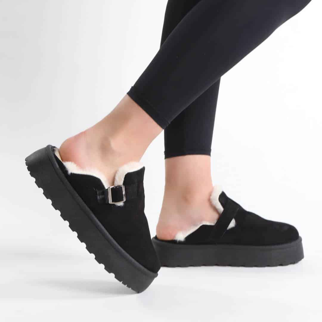 Elan - Chaussons à plateforme en Noir.