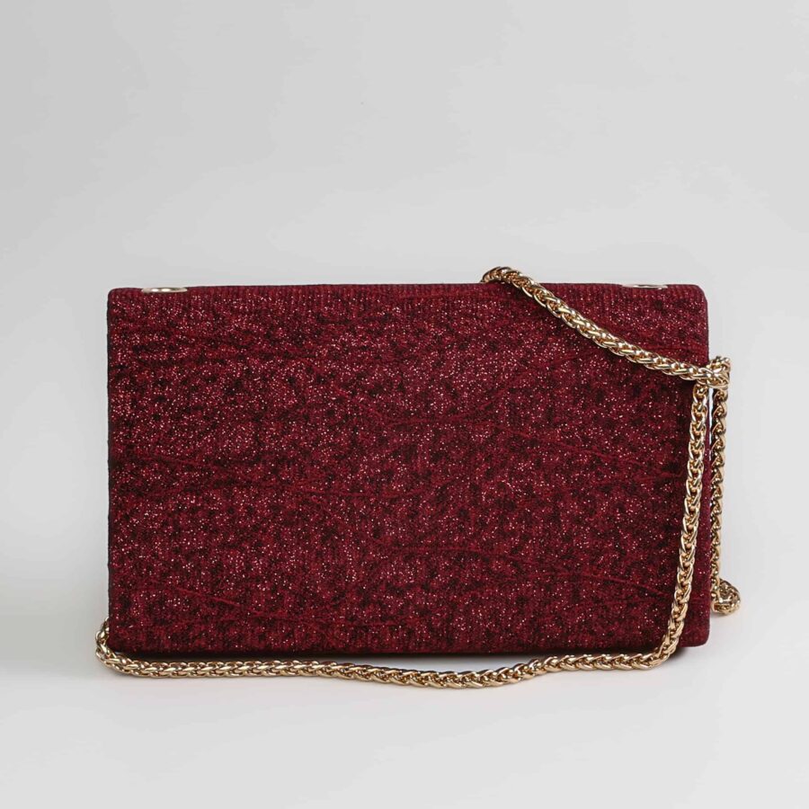Pochette de soirée en velours rouge à paillettes avec chaîne dorée élégante. Accessoire chic pour oc..