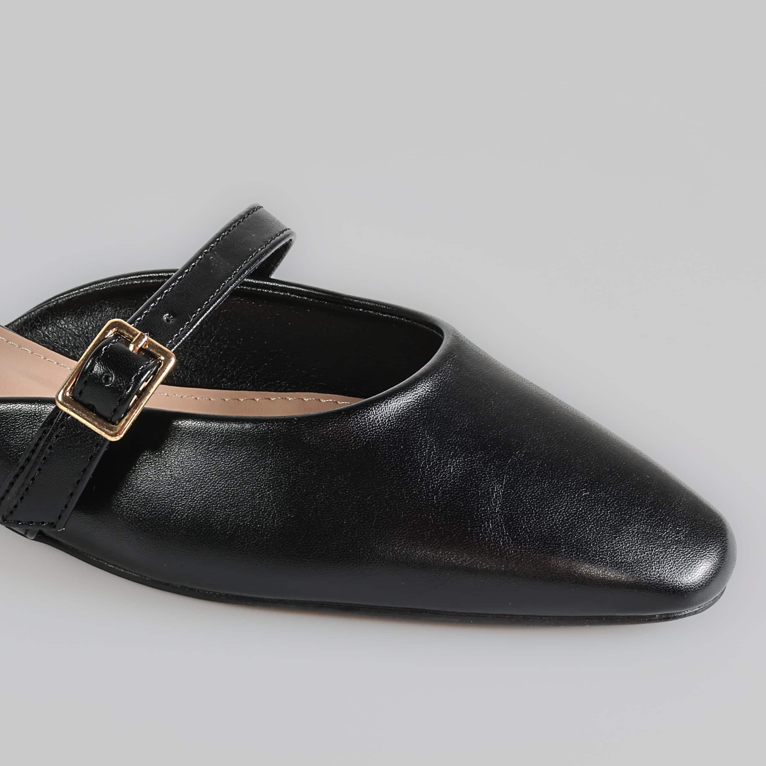 AURA – Mules demi talon en Noir.