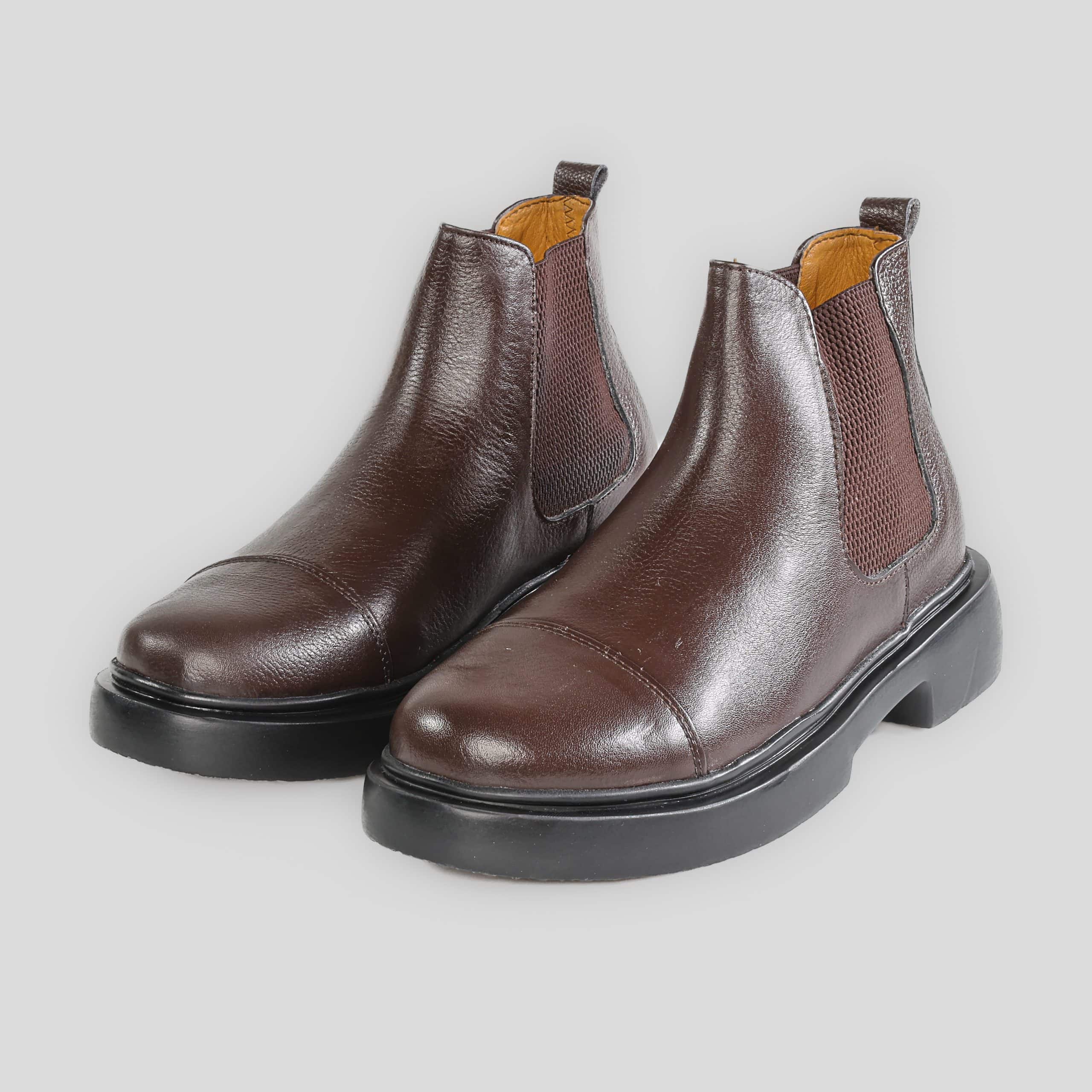 Clarcks – Boots Hommes en Cuir Marron.
